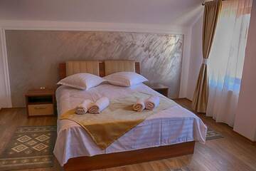 Фото номера Номер Делюкс Проживание в семье Casa Belvedere Pietrosu г. Мойсей 9