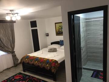 Фото номера Двухместный номер с 1 кроватью и собственной ванной комнатой Лоджи Cabana HATERE г. Мойсей 14